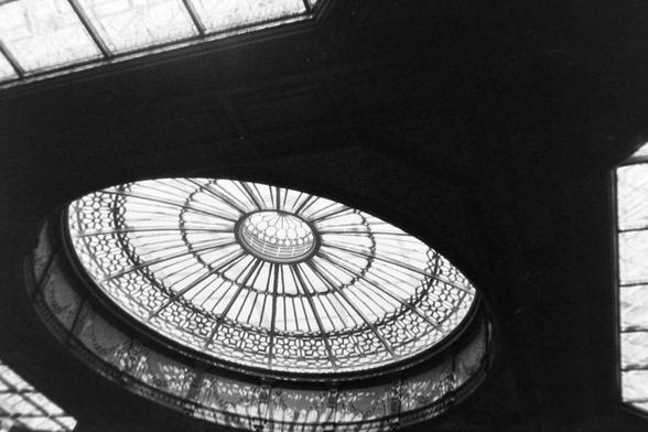 A black and white photograph of the atrium at Edinburgh Waverly Station