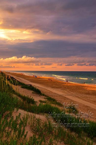 Golden sunlight bathes a serene beach, with gentle waves lapping at the shore under a dramatic sky. People stroll along the sand, enjoying the tranquil evening atmosphere.

Some of my favorite ways to daydream about the beach are remembering early morning wave-watching with a cup of coffee in my hands and my bare toes in the still-cool sand. Another is sitting under an umbrella on a sunny day with a good book in my lap. But one of the best is an evening stroll, watching the way the light lights up the sky.

"An Evening Stroll" ... my newest post ... a lovely evening stroll along the beach at the #OuterBanks in #Corolla, #NorthCarolina ... captured in July of 2020 with the Nikon D7000.  

available at my website:  https://lois-bryan.pixels.com/featured/an-evening-stroll-lois-bryan.html

and at #FineArtAmerica:  https://fineartamerica.com/featured/an-evening-stroll-lois-bryan.html

#art #sunset #AtlanticOcean #beach #NotAi #LoisBryan