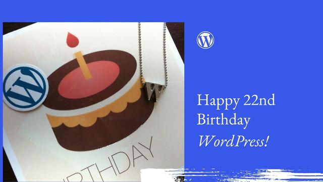 Blue background with a photo of a birthday cake, the WordPress logo, and the words: Happy 22nd Birthday WordPress!