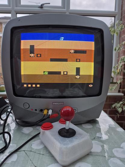 Dig Dug running and displayed on a CRT TV.