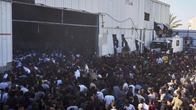 Four Palestinians die in storming of UN food warehouse a day after gunfire at new Gaza aid site