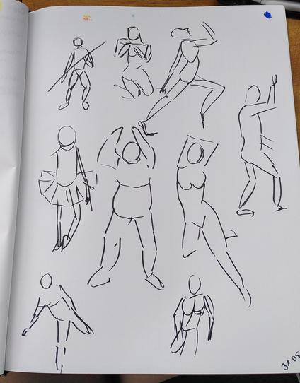 sketchbook page with several figures in different poses drawn with a black felt tip pen