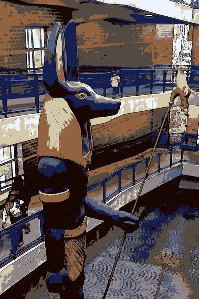 A photo of a statue of Anubis in the parking garage at the children's museum in Indianapolis given an overtreated digital effect.