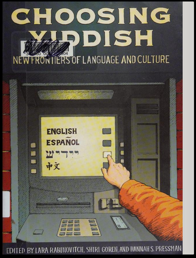 a book cover with a crossed out library barcode stuck on it. titled CHOOSING YIDDISH: NEW FRONTIERS OF LANGUAGE AND CULTURE, EDITED BY LARA RABINOVITCH, SHIRI GOREN, AND HANNAH S. PRESSMAN. the art shows an illustrated hand reaching to a bank ATM with language options on the screen. After English and Spanish the finger is selecting Yiddish.
