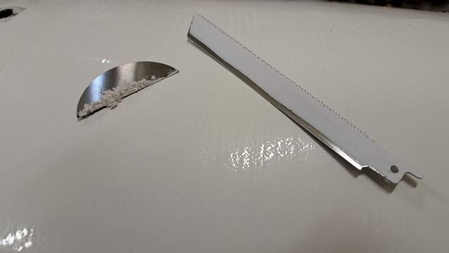 Testing various pieces of hardened steel to make a scraper that removes the tops of all the orange peel bumps. Some metal could not take or hold an edge well.