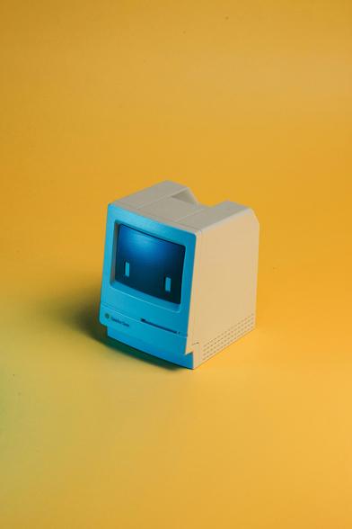 a miniature Mac Classic toy
Photo by insung yoon on Unsplash
