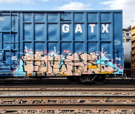 Train car with graffiti rolling through Kamloops BC Canada