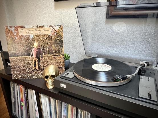 Brothers and Sisters by The Allman Brothers Band playing on a record player.