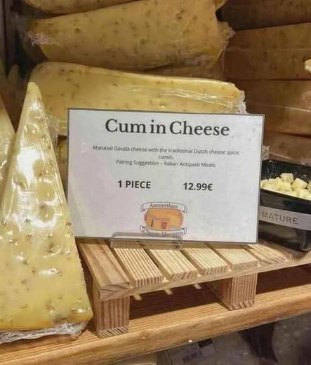 Misspelled sign for cheese- "Cum in cheese"
