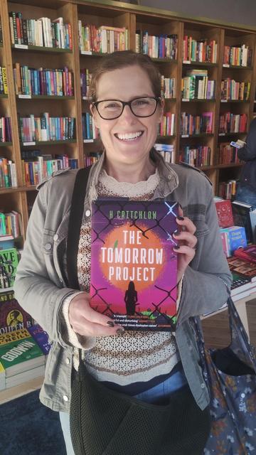 Author Heather Critchlow with her new novel, The Tomorrow Project, in the Edinburgh Bookshop .