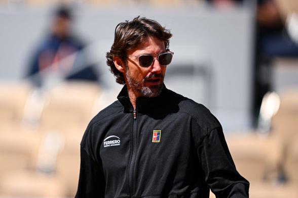Juan Carlos Ferrero reacts during a French Open practice session