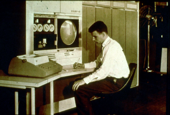 A DEC engineer at the console of the prototype PDP-6 in the early mid 1960s.