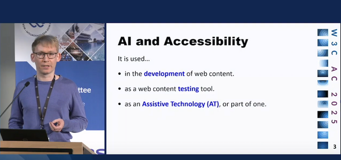 Snapshot of the video recording of Matthew Atkinson presenting the slide "AI and Accessibility"