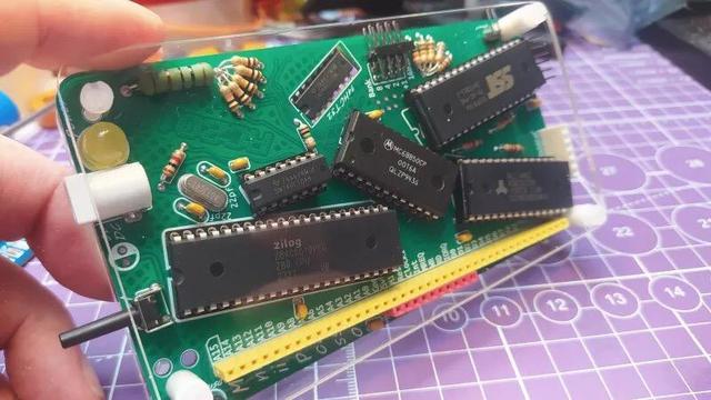 [ImageSource: concretedog]

The RC2014 Mini II, it’s a single-board Z80 retrocomputer that you can use to do fun things like run BASIC, Forth or CP/M.

However, where it gets kind of fun is in the layout. It’s the same fundamental circuitry as the RC2014, but it’s been given a rather artistic flair. The ICs are twisted this way and that, as are the passive components [even some of the resistors are dancing all over the top of one another].

The kit is a limited edition, too, with each coming with a unique combination of colors where the silkscreen and sockets and LED are concerned. Kits are available via Z80Kits for those interested.

<https://z80kits.com/shop/rc2014-mini-ii-picasso/>
