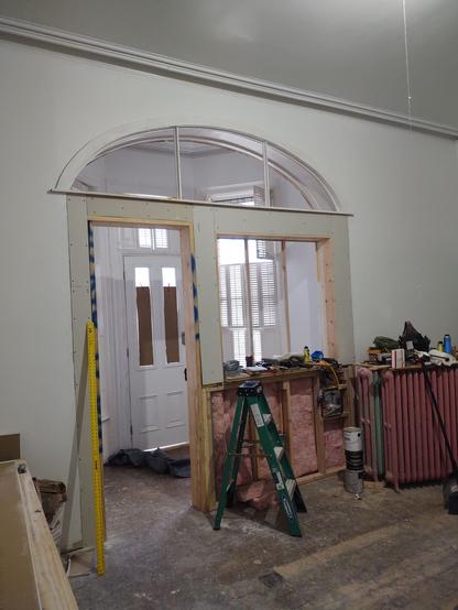 Tear out a bay window. Add a door that you asked me to take floating panels out of and replace them with fixed sealed glass units. Put a service counter under a plaster arch. With more sgu's . And hot water heat, just because. Ok. Sure . Did you want me to build it from the top down, just to make it a little harder?