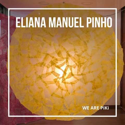 A yellow circular translucent collage with a light behind so it's brighter in the middle, with red behind.
Overlay of a thin white frame and the name Eliana Manuel Pinho at top, We Are Piki in smaller type at bottom right