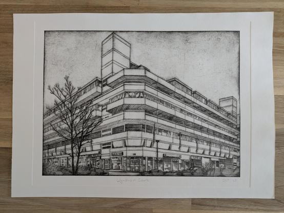 A black and white intaglio print of a large concrete building