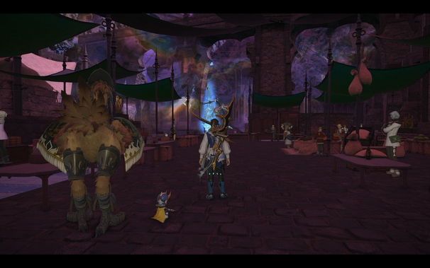 A dimly lit fantasy market scene within a cavernous space. A large chocobo with ornate armor stands in the foreground. A Moogle in a yellow cape walks near an armored character wielding a large, ornate bow. Tents are set up with green canopies. Various NPCs are seen browsing stalls in the background.