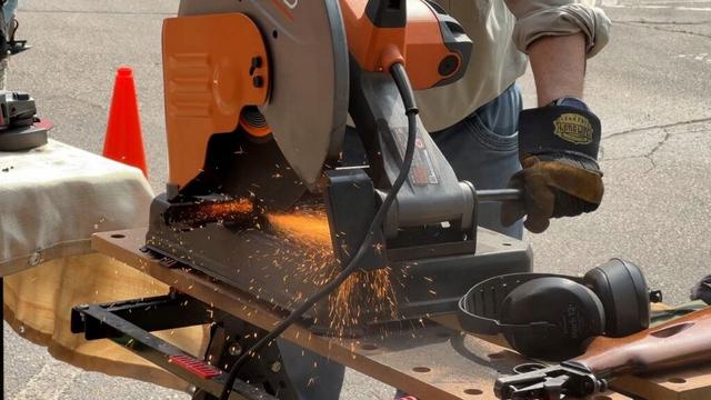 Volunteers turn surrendered guns into garden tools