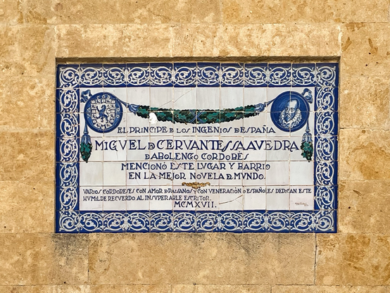 Plaque informing that Cervantes mentioned the Plaza del Proto in his novel Don Quixote.