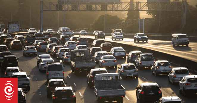 State Highway 16 full of slow moving morning traffic as the sun rises.