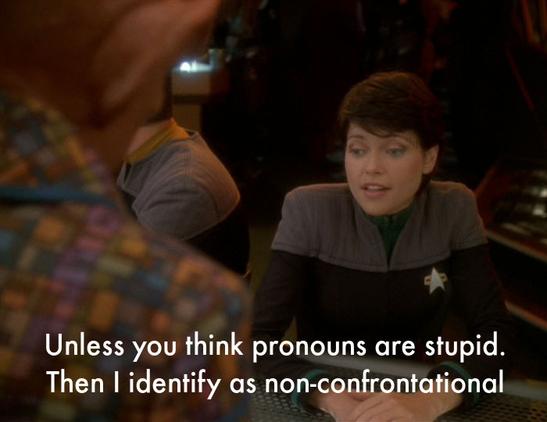 Star Trek Deep Space Nine screencap of Ezri Dax sitting in Quark's Bar. Caption reads "Unless you think pronouns are stupid. Then I identify as non-confrontational"
