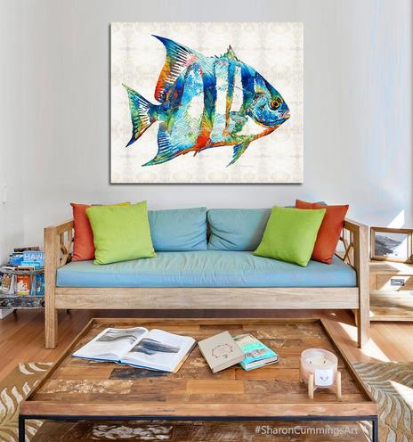 Colorful spadefish on a textured patterned background in a furniture setting by artist Sharon Cummings.
