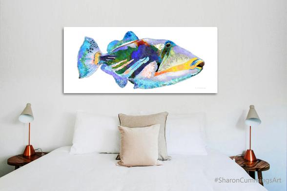 Colorful trigger fish on crisp white background in a bedroom setting by artist Sharon Cummings.