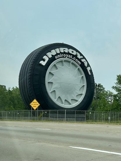 A photo of the giant Uniroyal tire on the eastbound side of I-94 in Allen Park, Michigan. If you’re headed east from the Detroit Metro Airport, you’ll see it.
