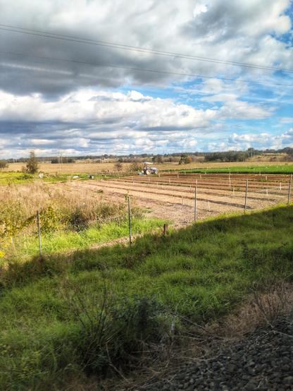 A tractor plowing a field.