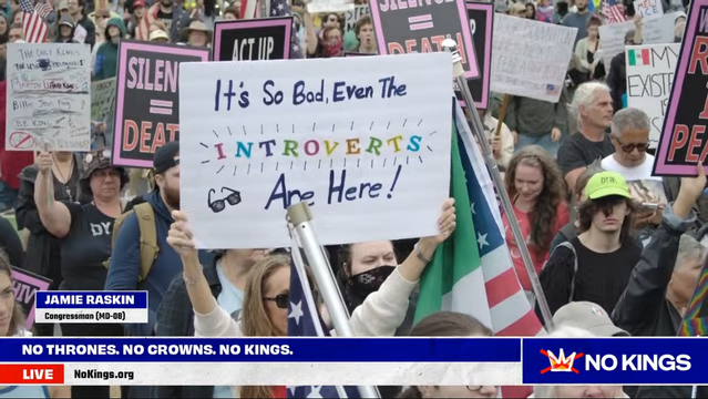 Group of protest signs from Philadelphia— one sign reads, “It’s so bad even the introverts are here!”