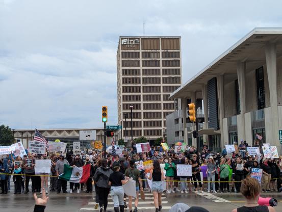 A shot of downtown between the library and courthouse. There were people all along the block but this was where quite a few gathered.