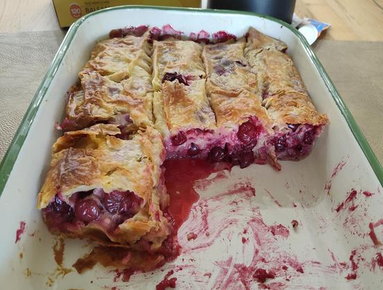 Cherry strudel in the tin, half already missing.