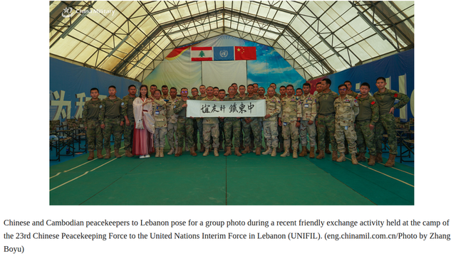Chinese and Cambodian peacekeepers to Lebanon pose for a group photo during a recent friendly exchange activity held at the camp of the 23rd Chinese Peacekeeping Force to the United Nations Interim Force in Lebanon (UNIFIL). (eng.chinamil.com.cn/Photo by Zhang Boyu)