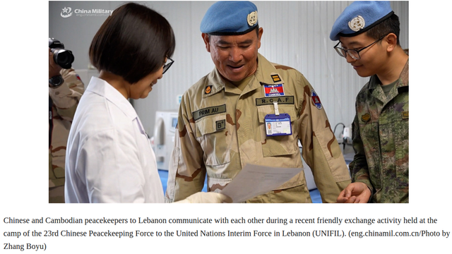 Chinese and Cambodian peacekeepers to Lebanon communicate with each other during a recent friendly exchange activity held at the camp of the 23rd Chinese Peacekeeping Force to the United Nations Interim Force in Lebanon (UNIFIL). (eng.chinamil.com.cn/Photo by Zhang Boyu)