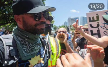 Enrique Tarrio at the No Kings rally in Miami getting flipped off and yelled at by the protesters