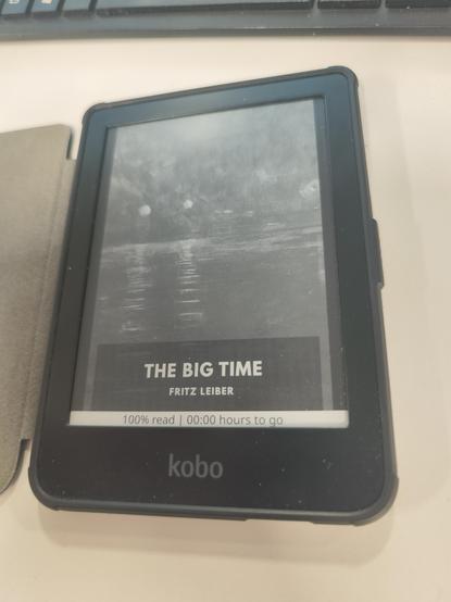 My Kobo displaying the book cover and 100% progress