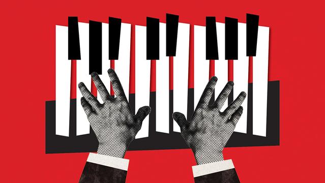 Hands playing the piano