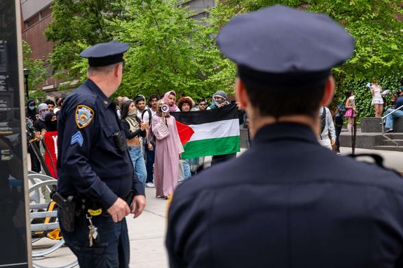 Pro-Palestinian students and others gather outside of Baruch College in Manhattan to protest the school's stance on Israel on May 9, 2024, in New York City.