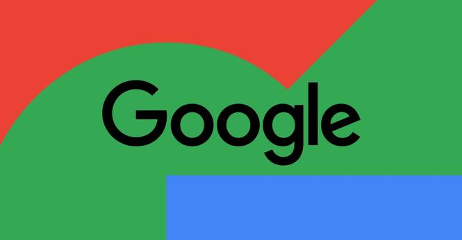 An image of Google’s logo on a red, blue, and green background