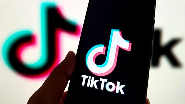 The TikTok logo on a smartphone. | CFOTO/Future Publishing via Getty Images