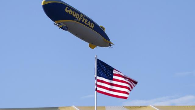 The Goodyear blimp hovers above the 16th hole during the Phoenix Open golf tournament, Sunday, Feb. 12, 2023, in Scottsdale, Ariz. (AP Photo/Darryl Webb, File)