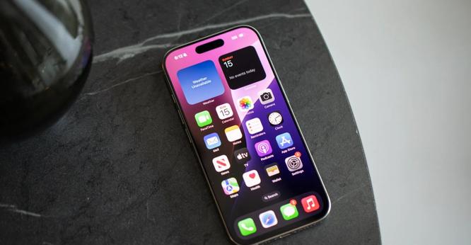 A photo of an iPhone 16 Pro on its Home Screen.
