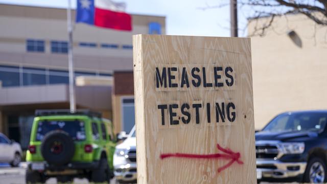 A sign is seen outside of Seminole Hospital District offering measles testing, Feb. 21, 2025, in Seminole, Texas. (AP Photo/Julio Cortez, File)