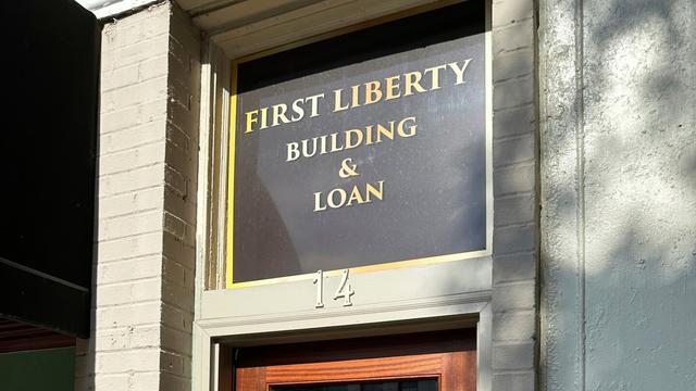 The office of First Liberty Building and Loan, which federal officials allege was a Ponzi scheme, is shown on Thursday, July 10, 2025 in Newnan, Ga. (AP Photo/Jeff Amy)