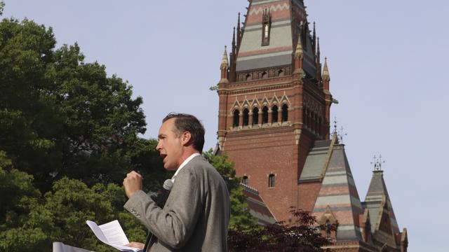 Ryan Enos, a government professor at Harvard University, speaks at a protest against President Donald Trump's recent sanctions against Harvard in front of Science Center Plaza on May 27, 2025, in Cambridge, Mass. (AP Photo/Leah Willingham, File)
