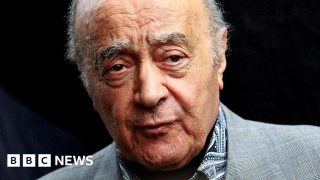 A close up photo of disgraced former owner of Harrods Mohamed Al Fayedm in a grey suit.