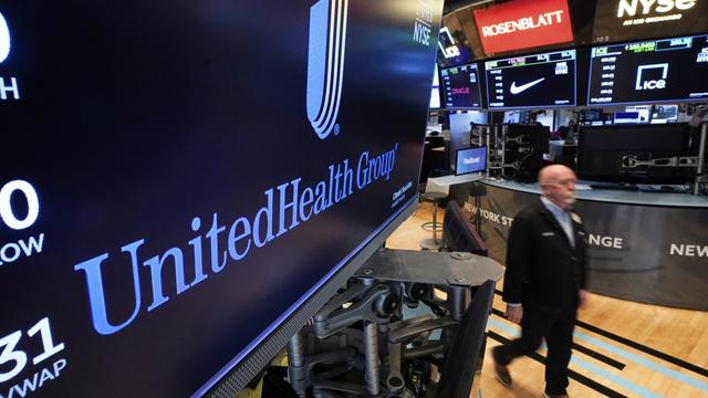 The logo for UnitedHealth Group appears above a trading post on the floor of the New York Stock Exchange, April 17, 2025. (AP Photo/Richard Drew, file)