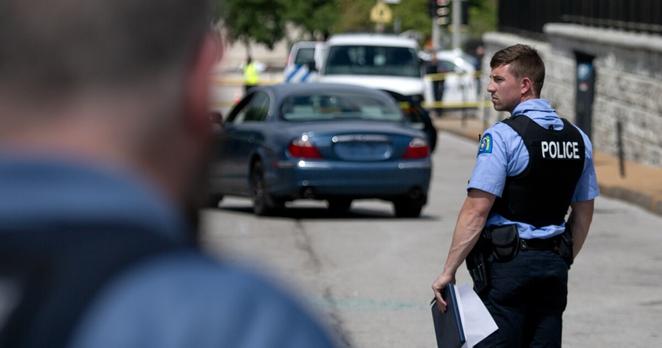 Police respond to a deadly shooting on Tuesday, Aug. 15, 2023 at Lindell and Spring, just off the campus of St. Louis University, in St. Louis. The shooting left one victim dead, with another person transported off the scene.