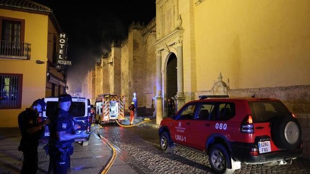 Firefighters work to extinguish a fire which broke out in the historic mosque-turned-cathedral in the southern Spanish city of Cordoba on 8 August 2025. | © Madero Cubero, AFP